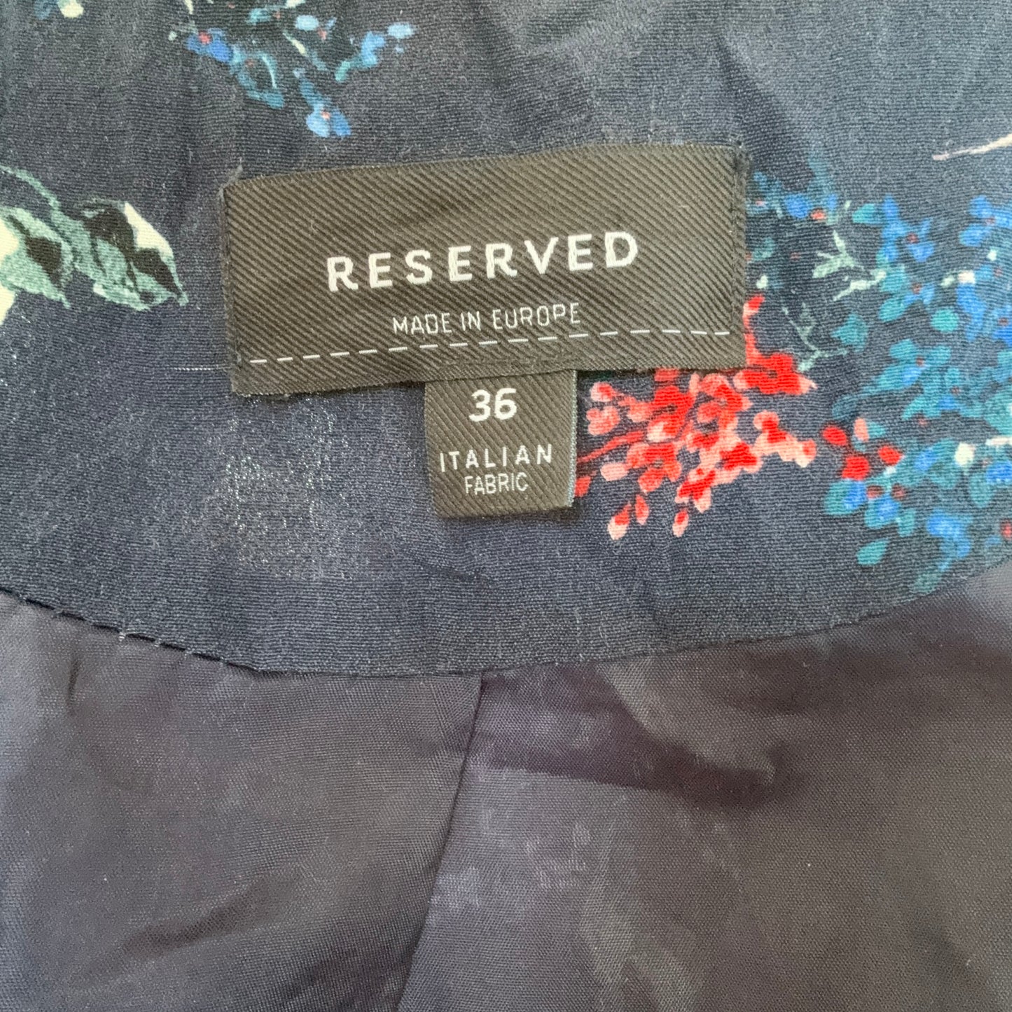 Veste bleue à motif floral