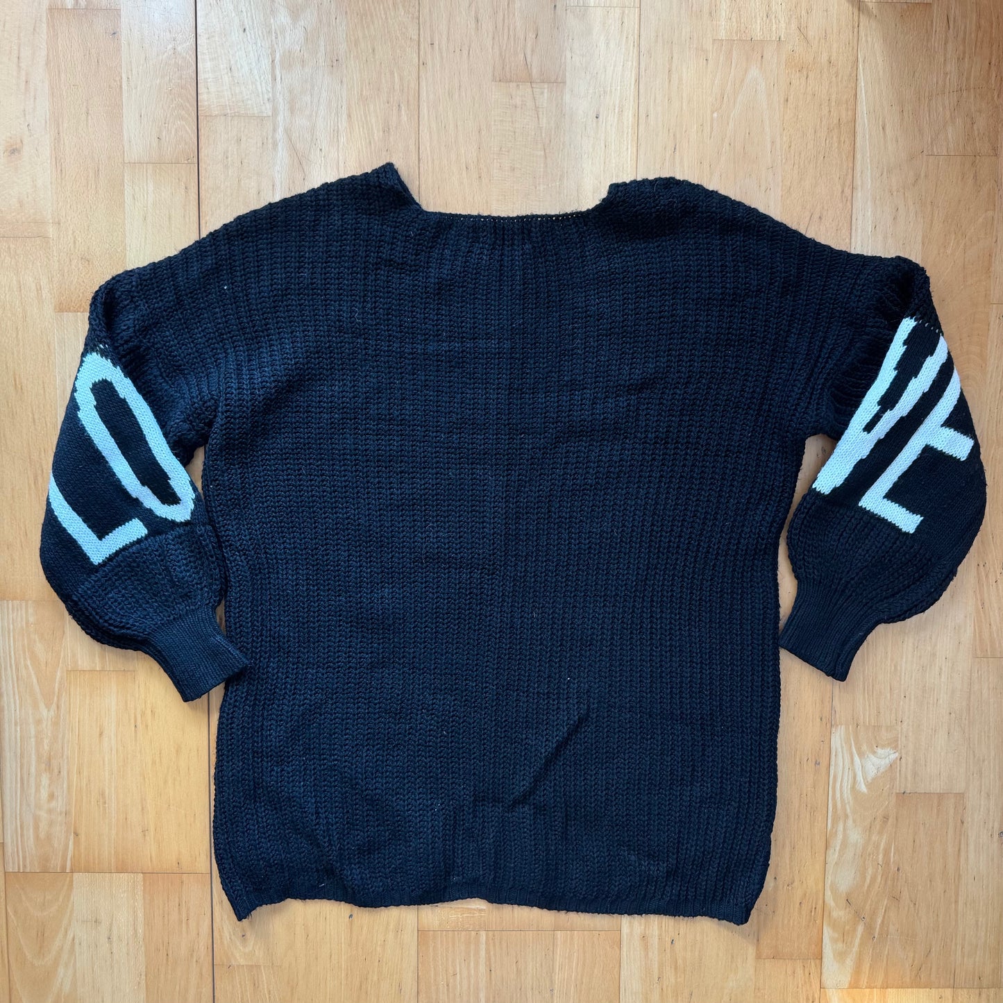 Schwarzer Strickpullover