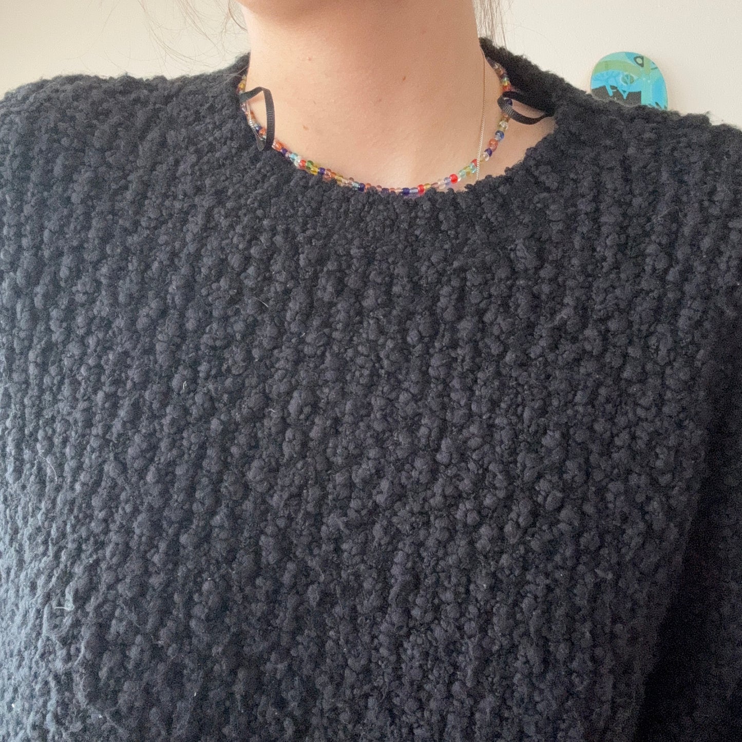 Schwarzer, kurzer Strickpullover