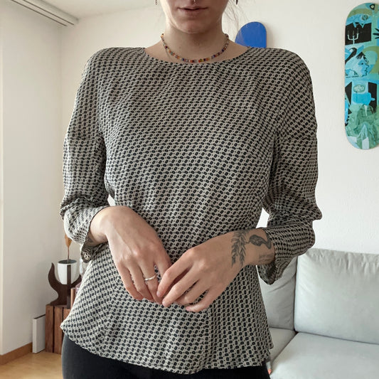 Chemisier beige à motifs noirs