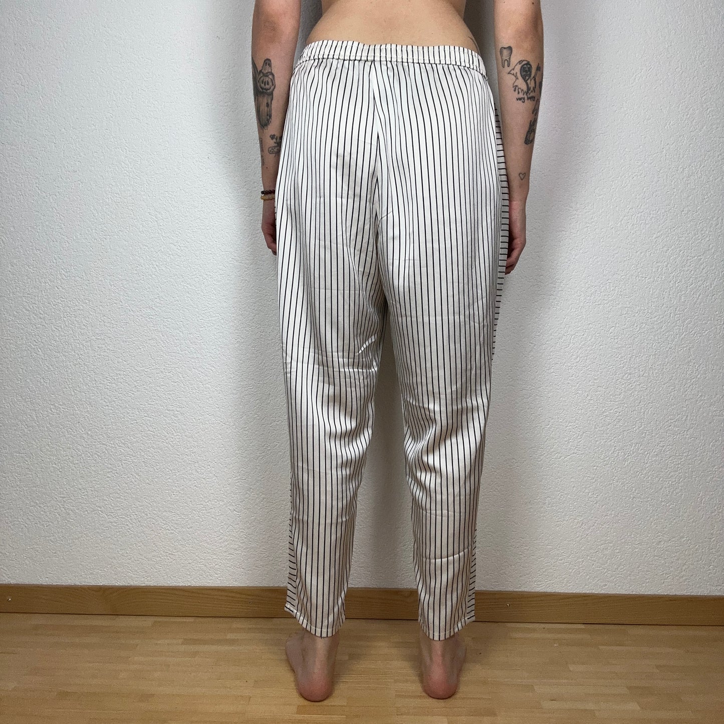 White Calvin Klein Pants with black stripes | Bern