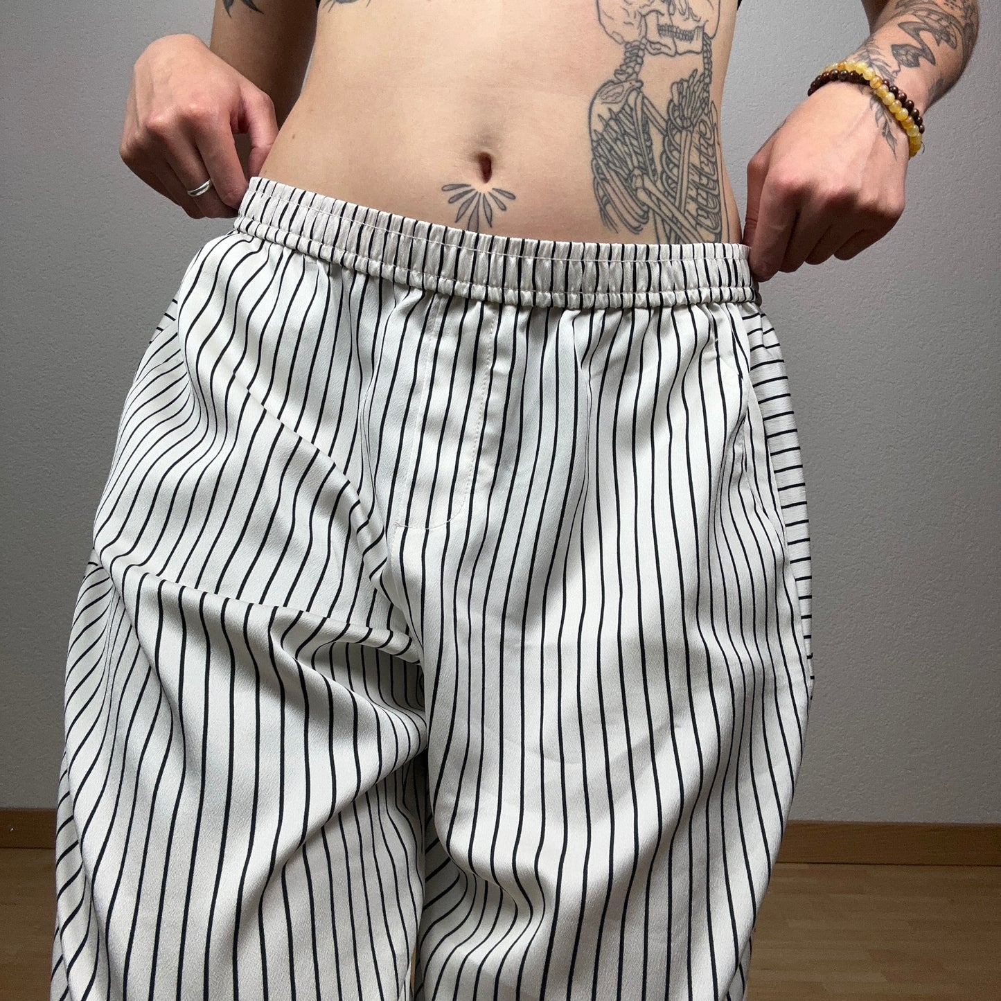 White Calvin Klein Pants with black stripes | Bern