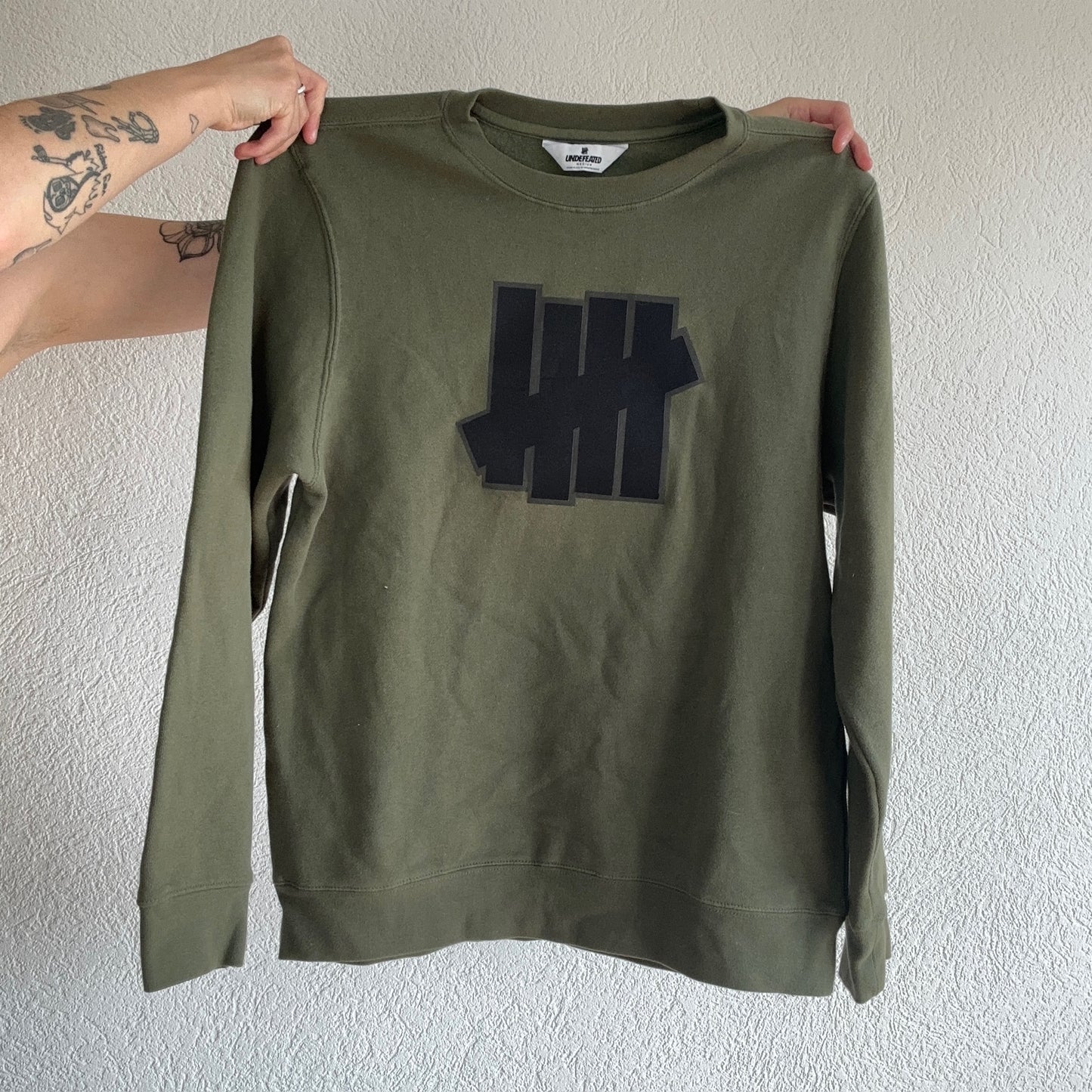 Grüner Pullover