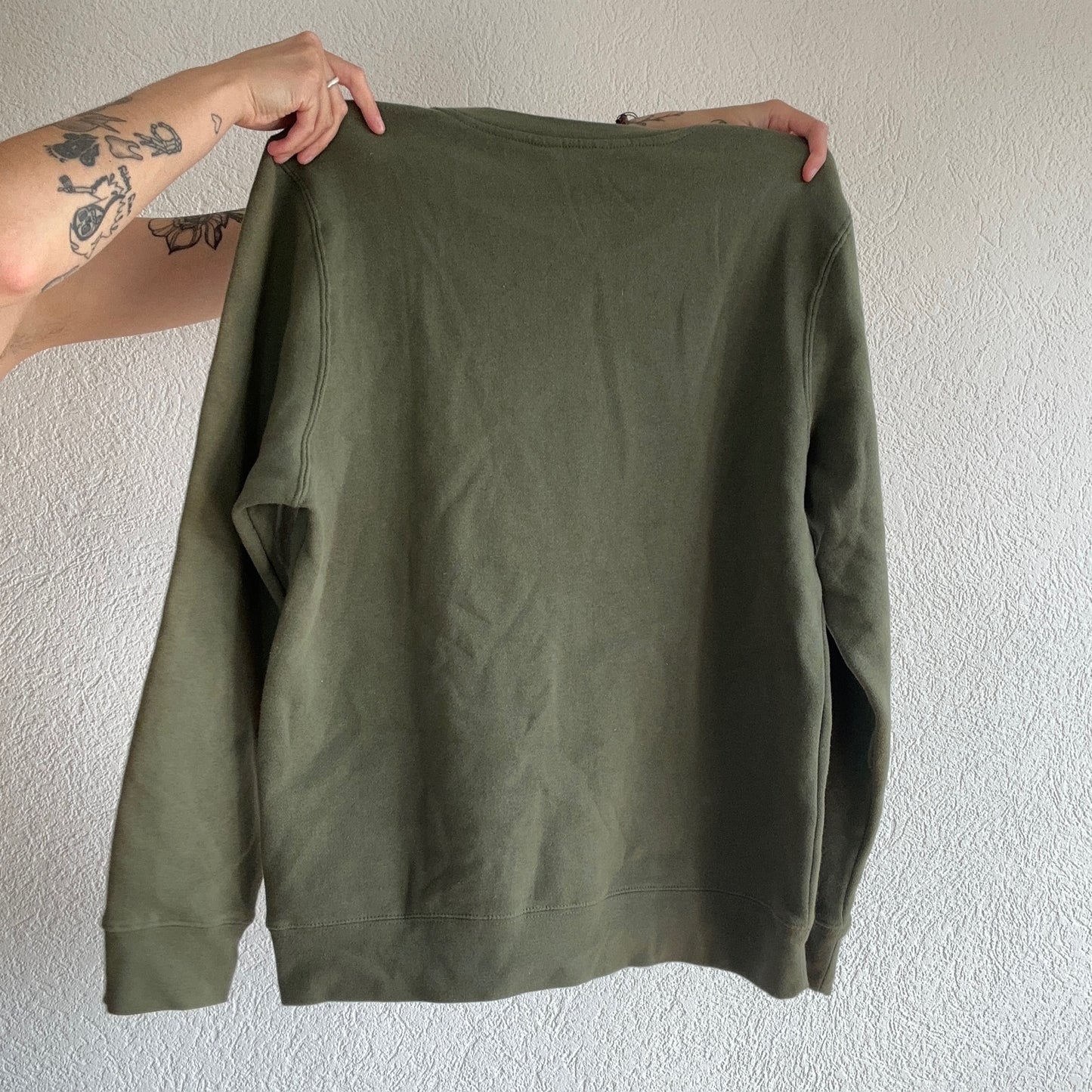 Grüner Pullover