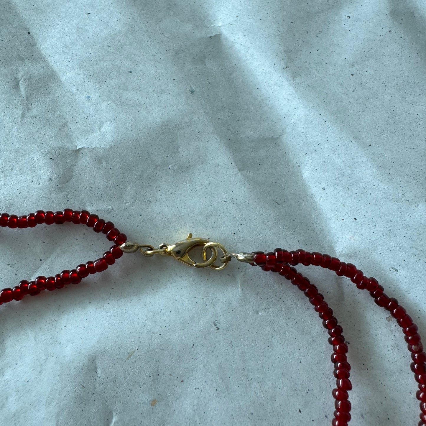 Rote Halskette | Bern
