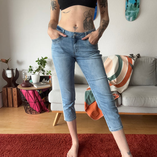 Blue Capri Jeans with white and gold stripes on the side