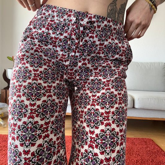 White pants with red, purple and black pattern | Bern