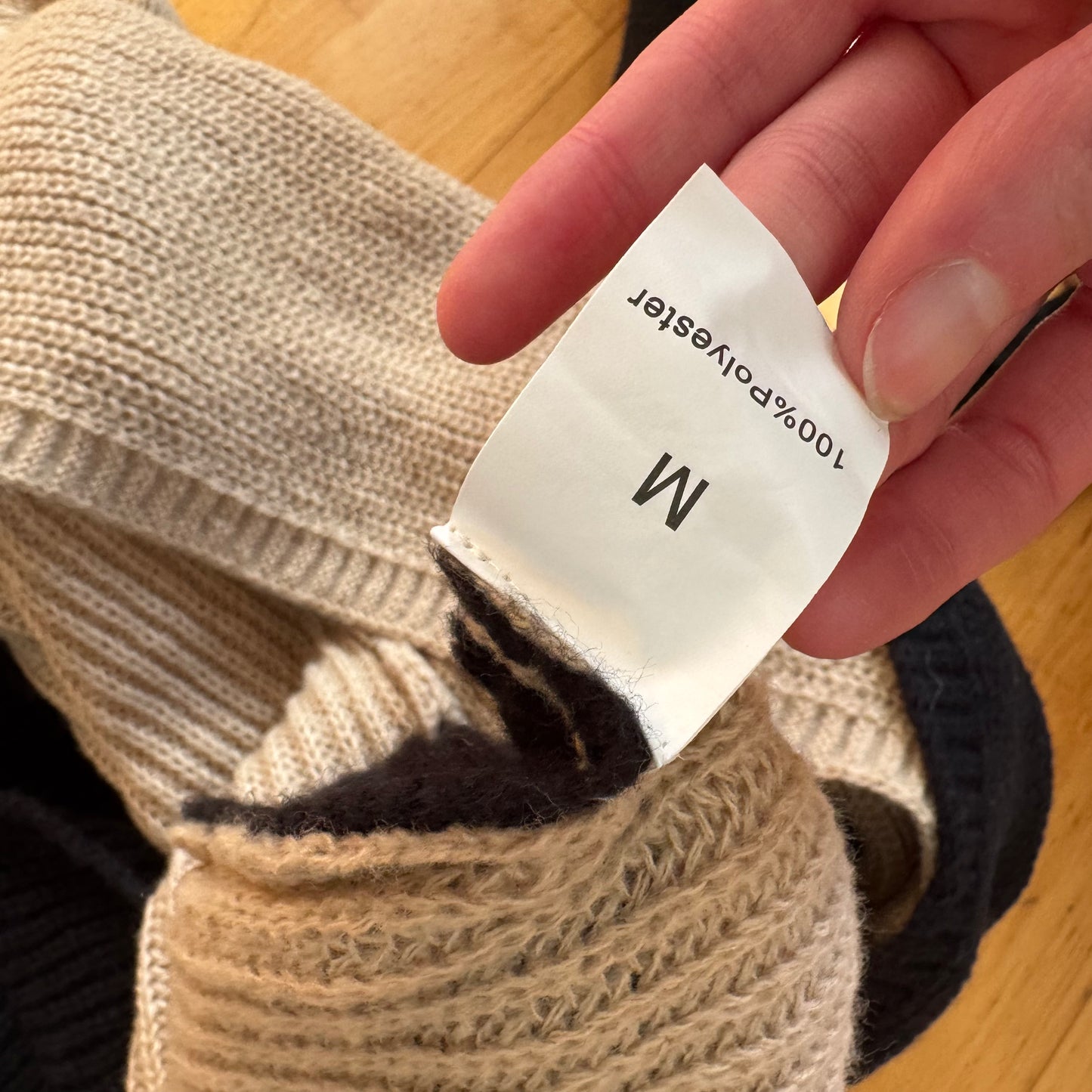 Pull en maille noir et beige