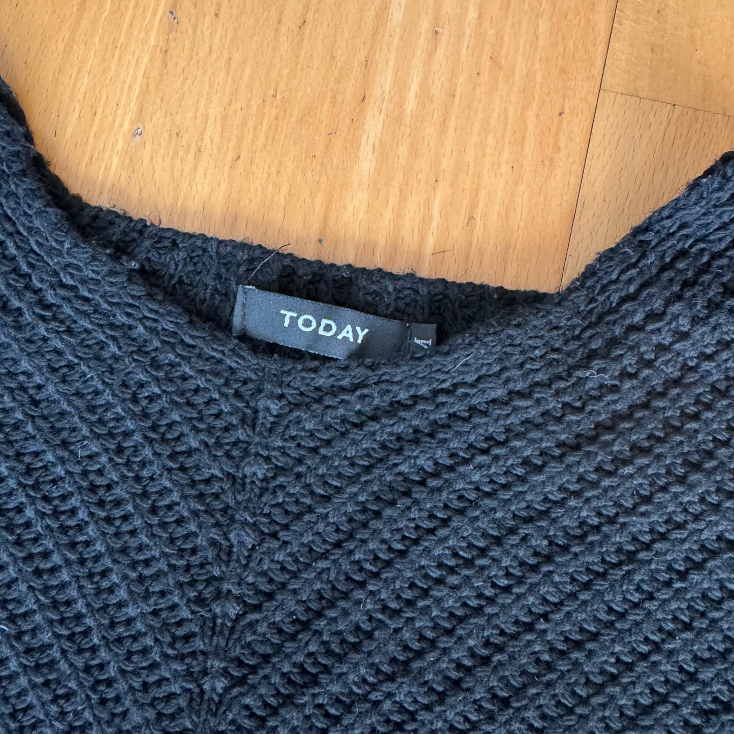 Schwarzer Strickpullover