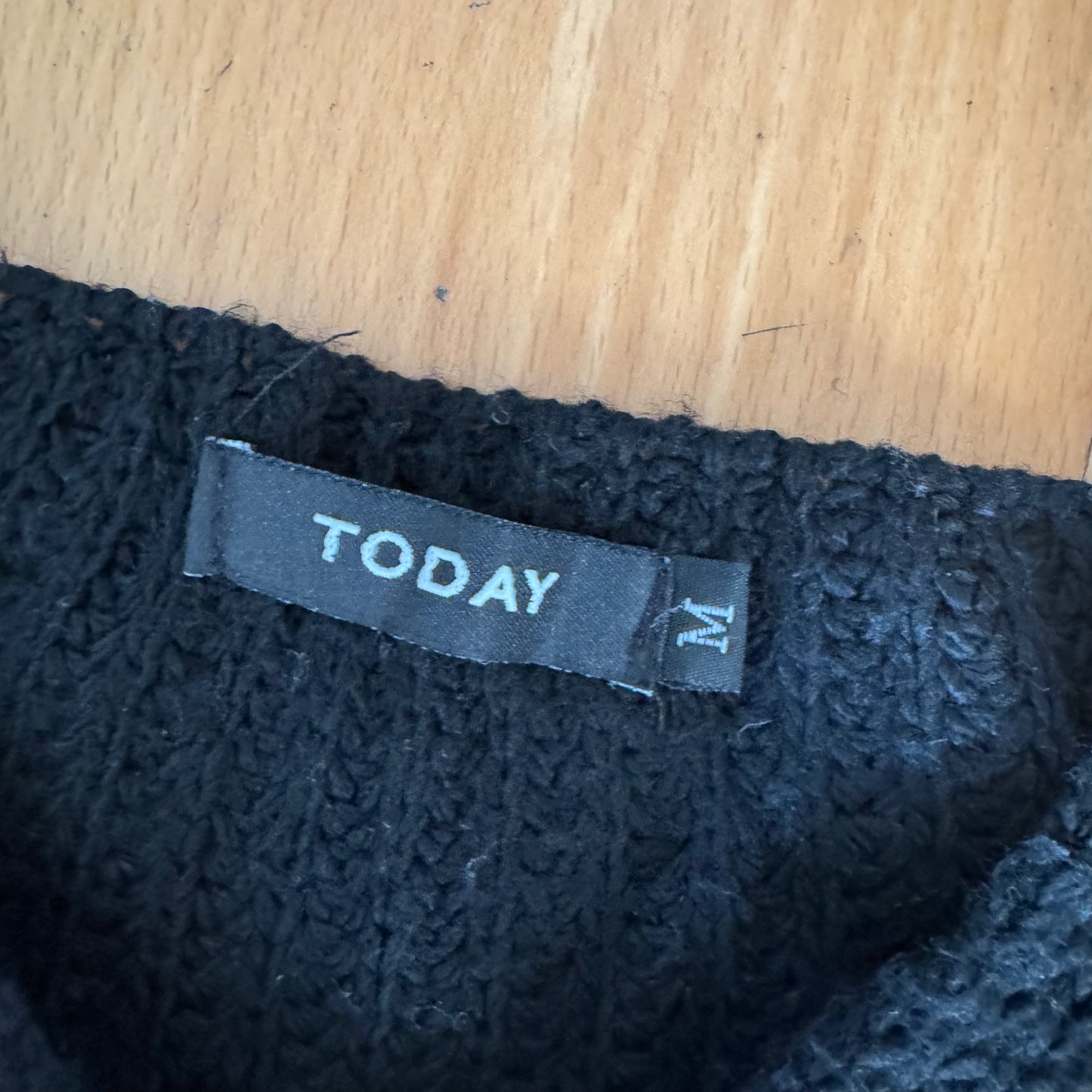 Schwarzer Strickpullover