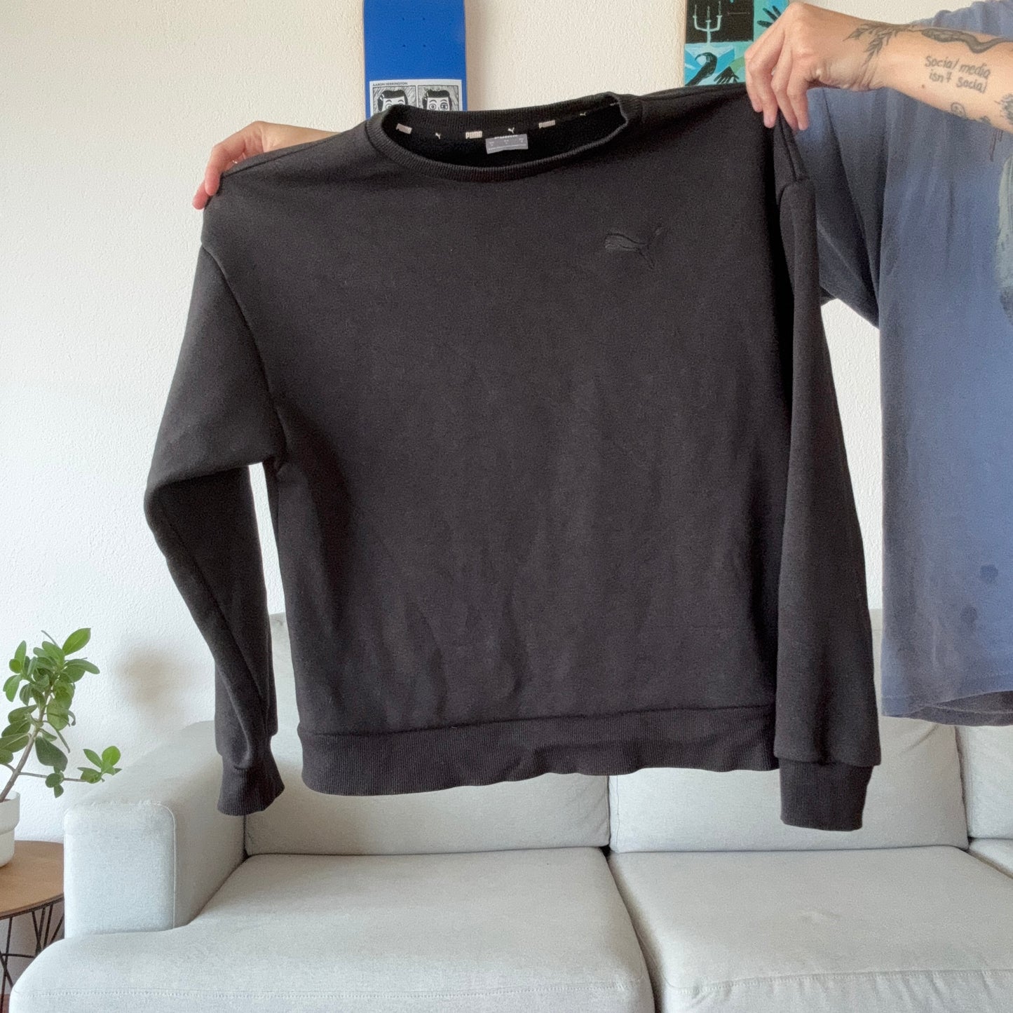 Schwarzer PUMA-Pullover